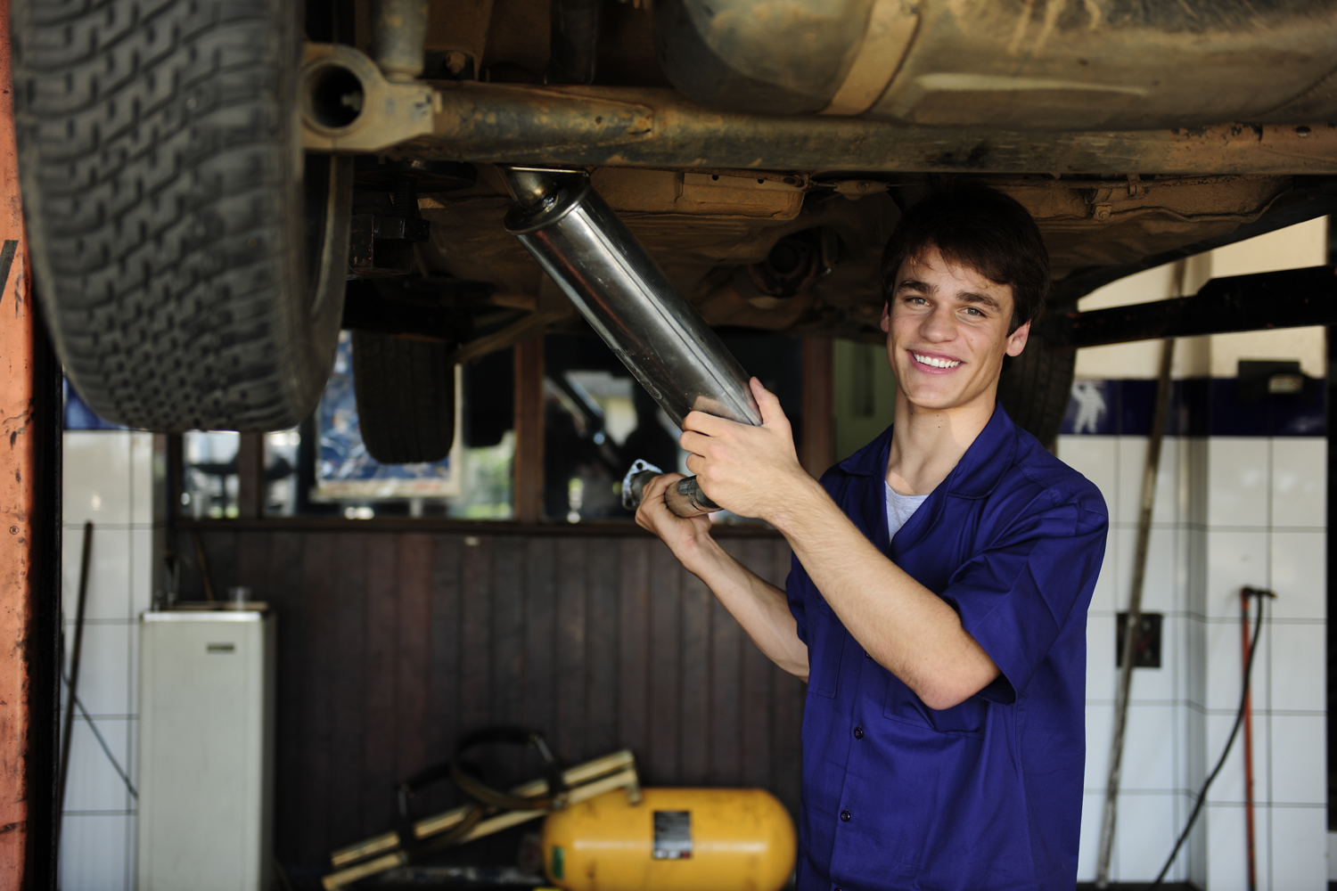 happy car mechanic at work